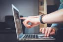 Person optimizing an ATS-friendly resume with Expertresume in 2025
